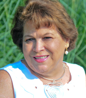 Carolyn Mills, Receptionist